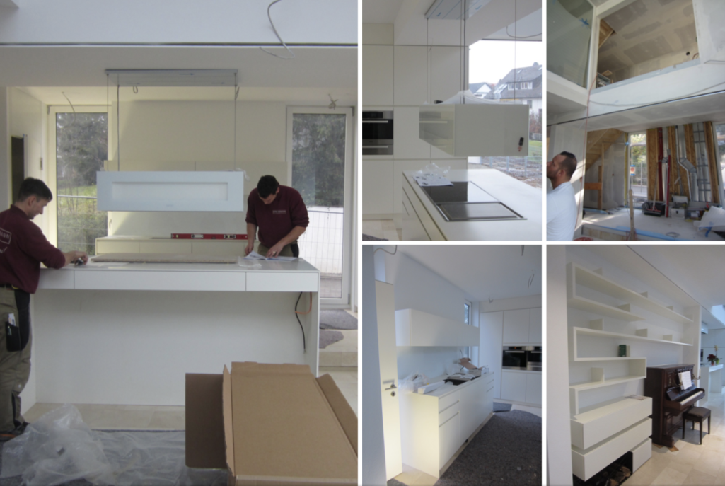 Raumeindrücke raumbildender innenausbau Moderne Kücheneinrichtung mit weißen Möbeln und Arbeitsflächen, Installation in Arbeit.