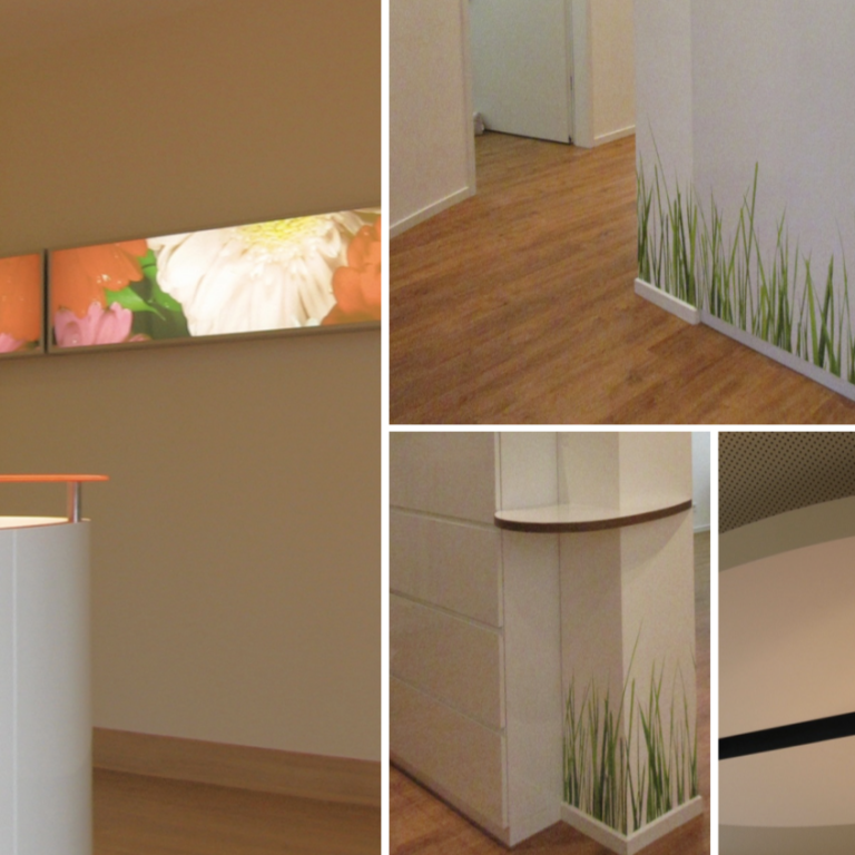 Moderne Inneneinrichtung mit blühenden Bildern und grünen Rasenmotiven an Wänden.